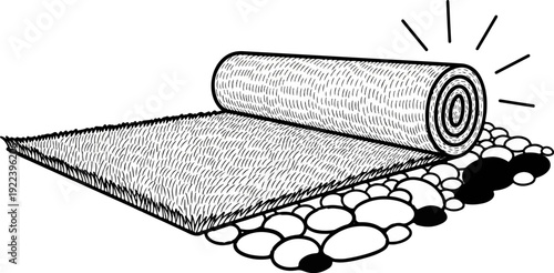 Unrolled sod, a roll of grass on top of stones