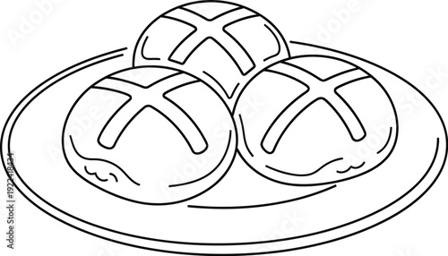 Three hot cross buns on a plate for easter celebration baking