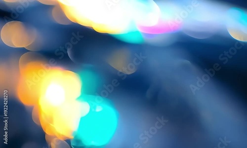Colorful bokeh lights. Blurred background. Multicolored defocused lights. Nighttime scene. Dark blue background with colorful bokeh. Abstract bokeh texture. Light blur effect. Colorful