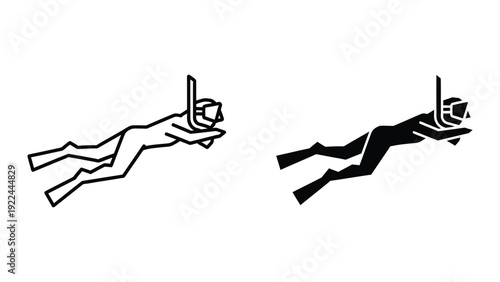 Scuba divers in silhouette