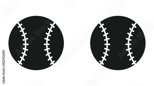 Two black baseballs on white background