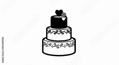 Stylized black and white three-tiered cake with ornate frosting details