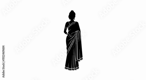 Silhouette of a woman adorned in a traditional sari, with hair styled up