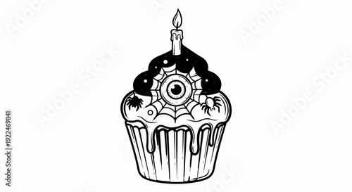 Spooky cupcake with an eye, web, spiders, and candle
