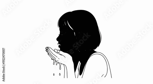 Silhouette of a woman splashing water on her face with her hands