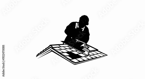 Silhouette of a worker laying tiles on a roof