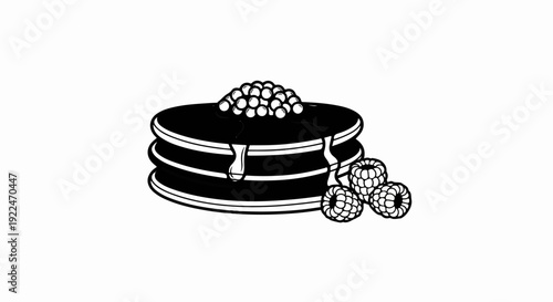 Stack of pancakes drizzled with syrup and topped with berries, with raspberries