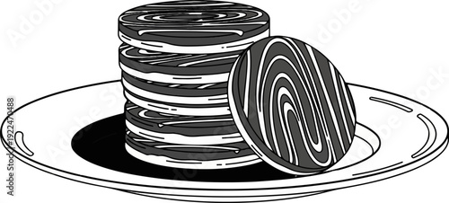 Stack of swirled cookies on a white plate