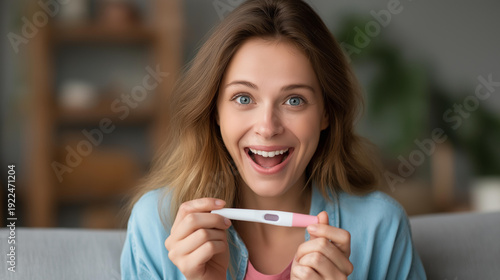 Girl pregnancy test excited or surprised in home, fertility and IVF success journey, new mother happy with results, testing kit on sofa, future motherhood moment, defocused interior background,