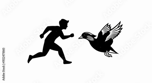 Silhouetted figure running towards a flying bird