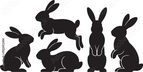 Silhouettes of easter bunnies isolated on a white background. Set of different rabbits silhouettes for design use.