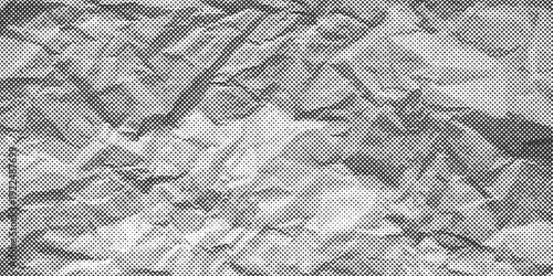 Grunge Halftone paper effect. Halftone crumpled paper texture with black a dotted, rough, and wrinkled surface. Wrinkled white paper in halftone collage style. Vector background