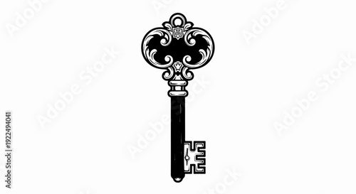 Ornate antique skeleton key with decorative scrollwork and intricate bit