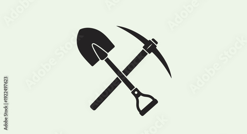 Silhouette icon of a crossed shovel and pickaxe representing mining, construction, and heavy manual labor work.