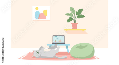 Gray cat lies on its back on a rug in a room with a laptop and a beanbag chair.