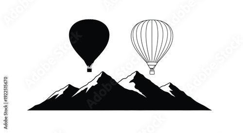 Mountain landscape with hot air balloons in stark black silhouette