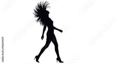 Dynamic woman with flowing hair captured in a striking silhouette