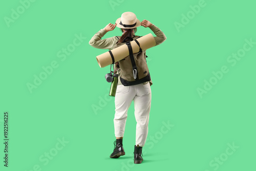 Female guide on green backg...