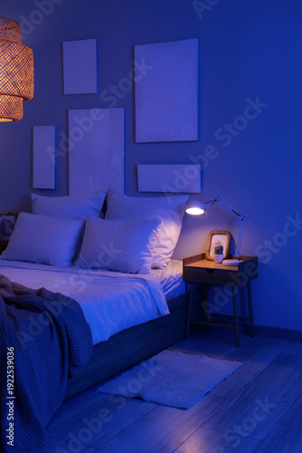 Interior of dark bedroom wi...