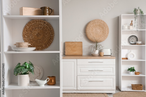 Shelf unit with dishes and ...