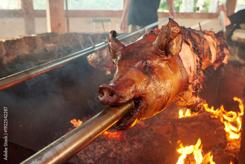 Whole Pig Roasting on a Spit