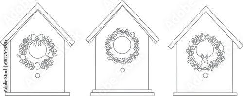 Three birdhouses decorated with floral wreaths for spring or easter theme
