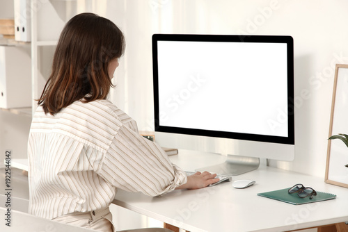 Young woman working with bl...