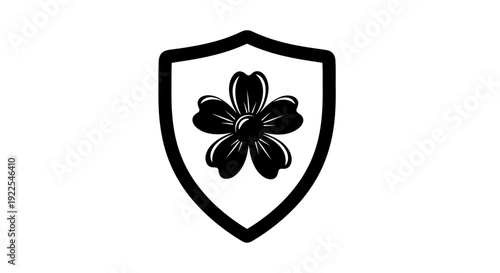Black shield emblem with flower symbol inside.