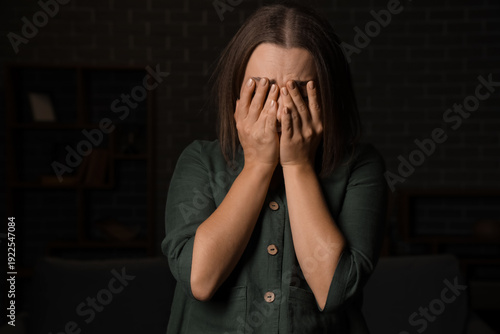 Scared young woman at home....