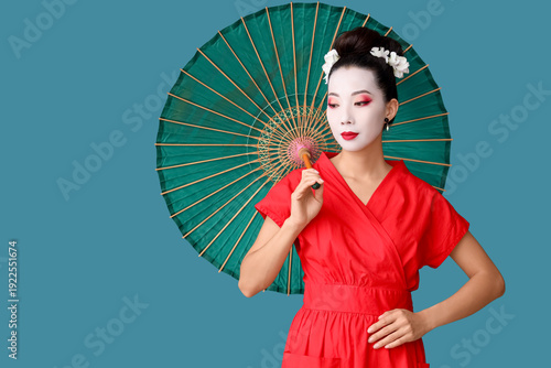 Beautiful young geisha with...