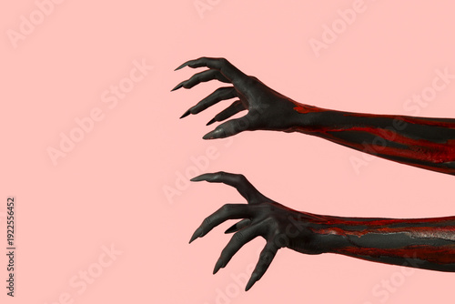 Black witch hands with claw...