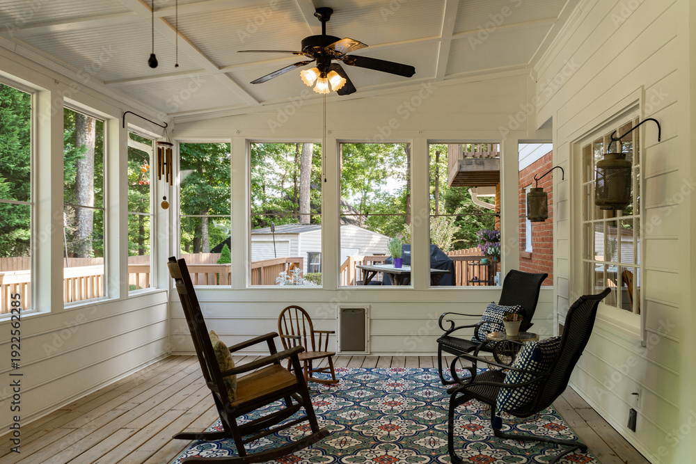 Ταπετσαρία Sunroom with rocking chairs and large windows viewing wooded backyard