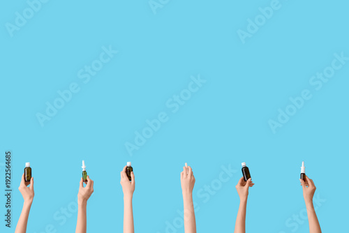 Female hands with nasal dro...