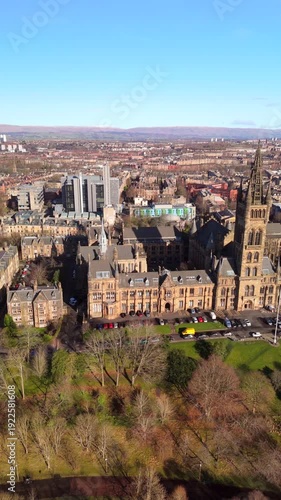 Drone view of Kelvingrove Park and Gilmorehill on a sunny golden hour winter morning in Glasgow Scotland