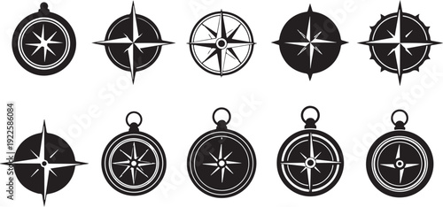 Set of various black and white compass navigation icons