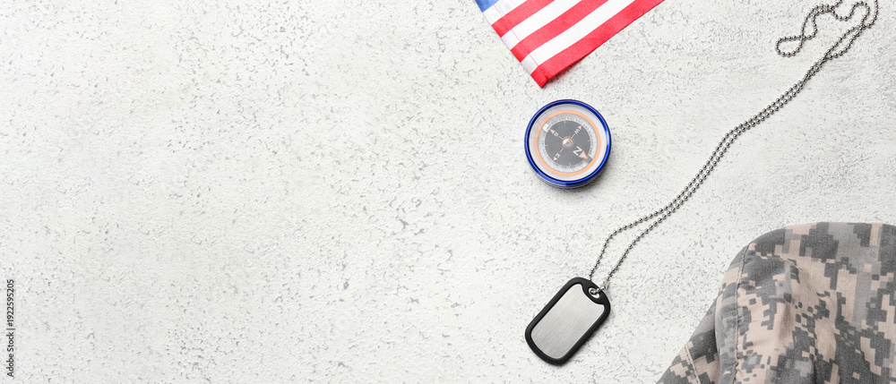 Fototapeta premium Military tag, compass, cap and national flag of USA on light background