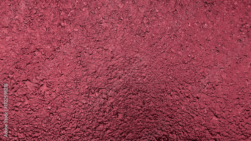Wet asphalt texture background in red tones