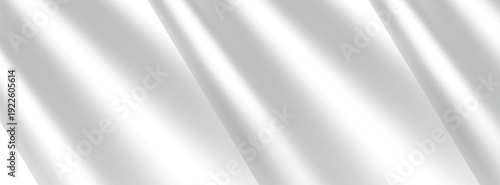 A close-up view of flowing white fabric with intricate folds and creases, showcasing texture and drapery, in a dynamic, abstract composition