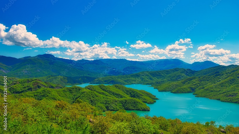 Obraz premium Bovilla, Albania - April 27, 2024. Attractive spring view of Bovilla Lake, Tirana city location. Majestic morning landscape of Albania, Europe. Beauty of nature concept background. Hike, breath relax 