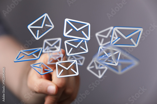Hand reaching out to email ...