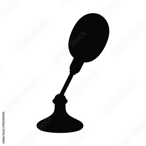 A silhouette of a vintage atomizer with a pear shaped bulb