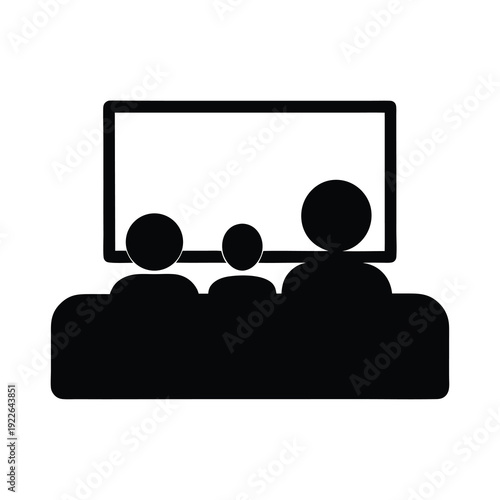 Family time watching a movie together at home on the couch