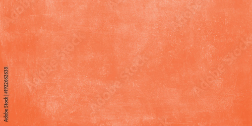 A vintage red wood texture background features an aged grunge pattern on a rough antique surface with hints of brown and orange for a weathered material backdrop