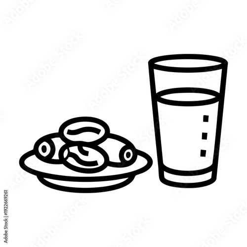 Ramadan iftar meal with dates and a glass of water