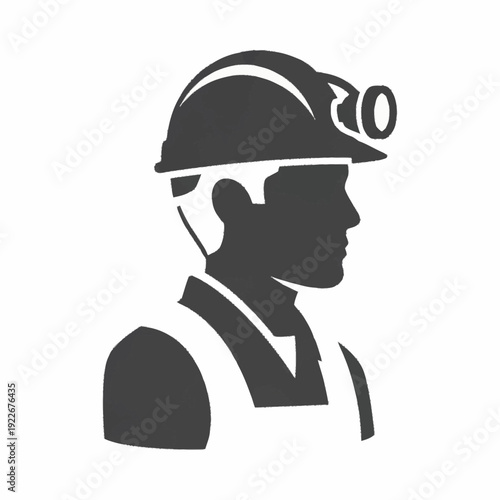 Silhouette of a miner or construction worker wearing a hard hat with a headlamp.