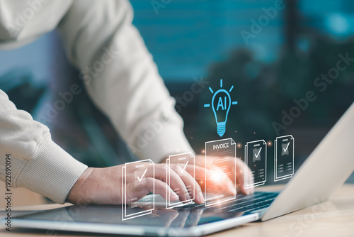 AI invoice processing concept, entrepreneur typing on laptop in workspace, managing digital billing documents and automated approval workflow through intelligent artificial intelligence platform.