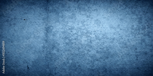 Aged blue grunge texture featuring a dark weathered concrete wall pattern with a rough vintage paint surface for a dirty industrial backdrop design