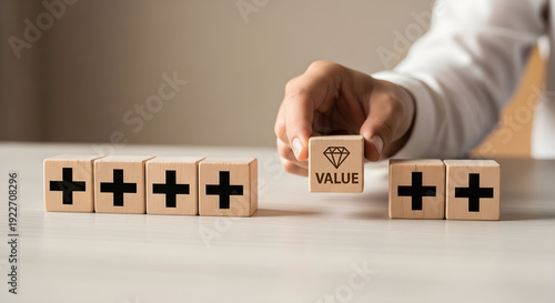 Adding value concept illustration with wooden blocks and positive plus signs for business growth