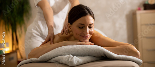 Cuadro en lienzo Relaxing massage session at a wellness center in the evening
