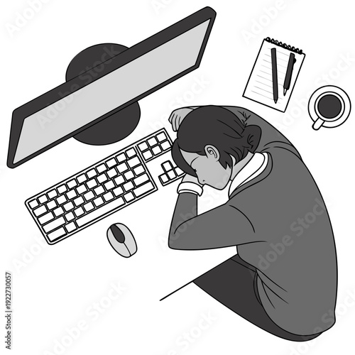 A person sitting at a desk looking stressed while working on computer